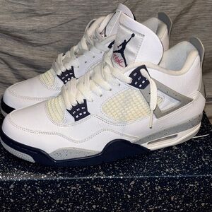 Air Jordan 4 Retro White and Navy Sneakers